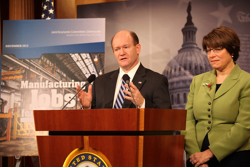 Photo of Senators Coons and Klobuchar unveiling new report on manufacturing jobs