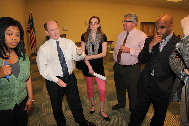 Sen. Coons listens to members of the Urban Unemployment Series attendees