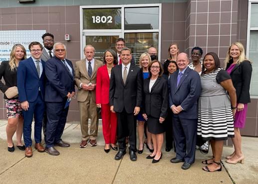 A group of people posing for a photoDescription automatically generated