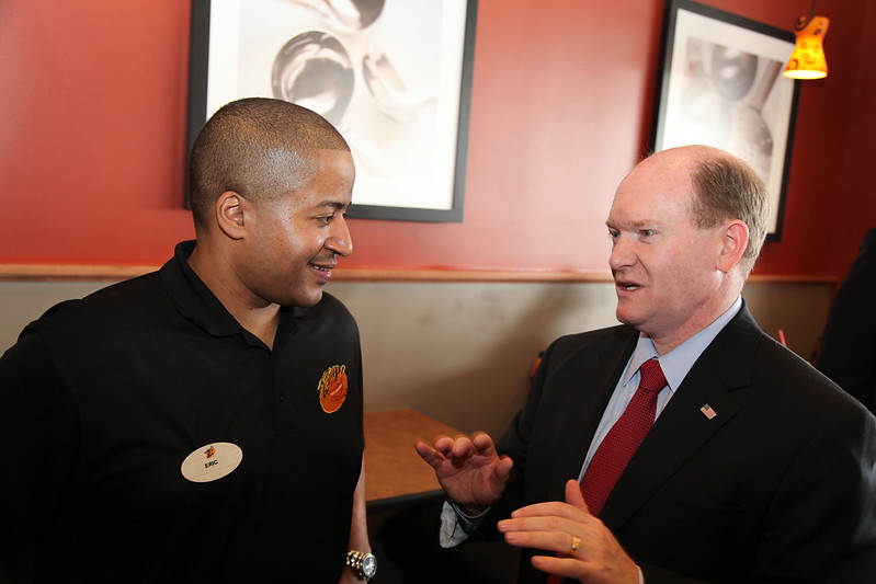 Senator Coons speaks with Eric Ames, owner of Zoup!