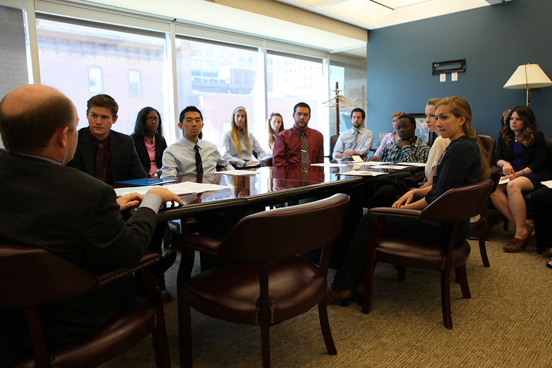 Photo of Senator Coons meeting with young Delawareans about Joseph Kony
