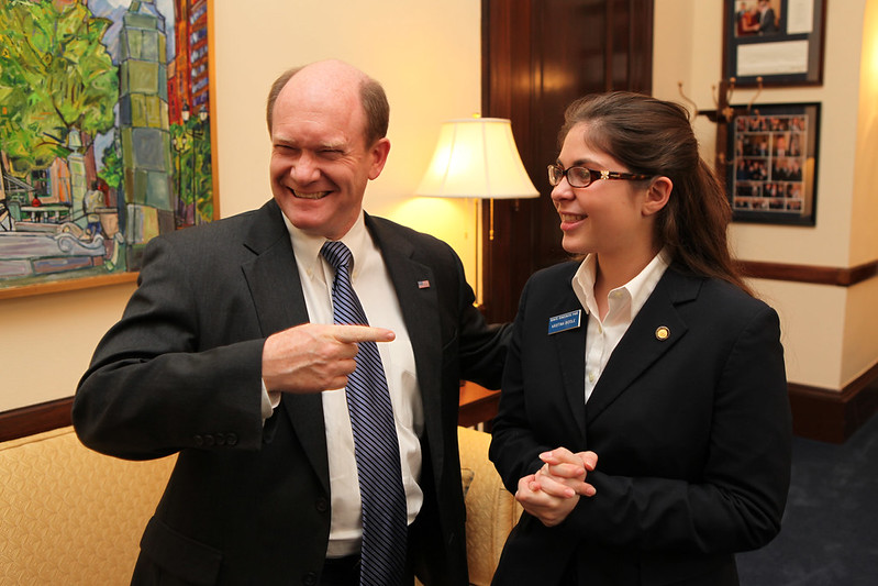 Senator Coons shares a laugh with his first Senate page, Kristina Biddle.