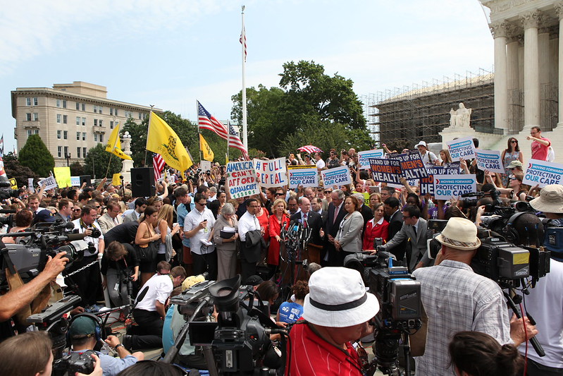 Photo of press conference at steps of Supreme Court