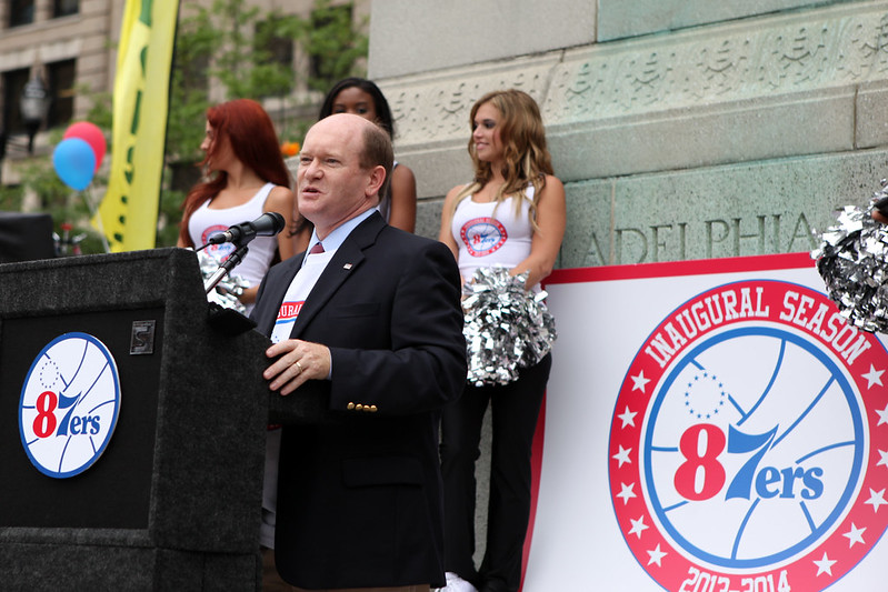 U.S. Senator Chris Coons helps celebrate the Sixers' D-League team, the 87ers, at a pep rally in Wilmington's Rodney Square on August 7, 2013.